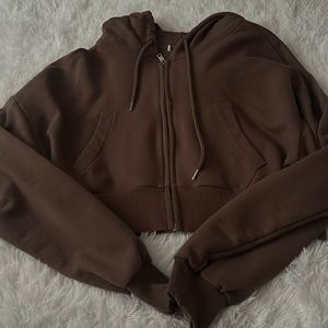 Cropped zip up sweatshirt, perfect condition. Only worn once.